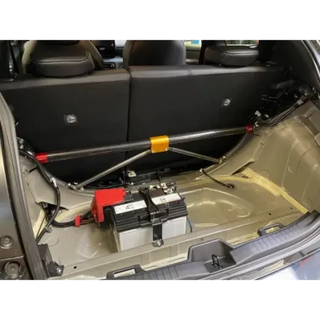 DNA Racing four-seater carbon rear strut bar with tie rods kit