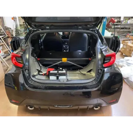 DNA Racing four-seater carbon rear strut bar with tie rods kit